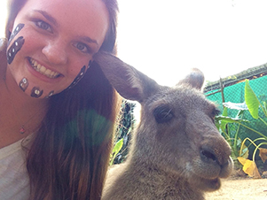UNL junior Anastasia Sanderson meets a wallaby during a visit to a zoo in Cairns, Australia.