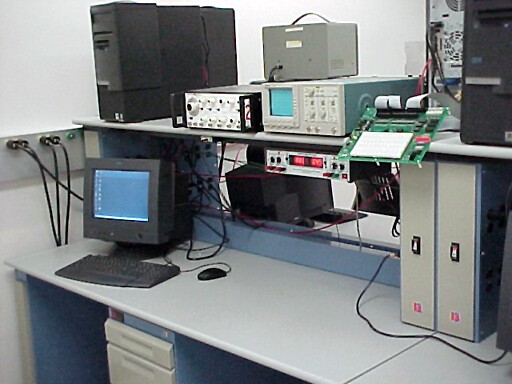 A typical workstation in 312 stocked with equipment in an open lab setting