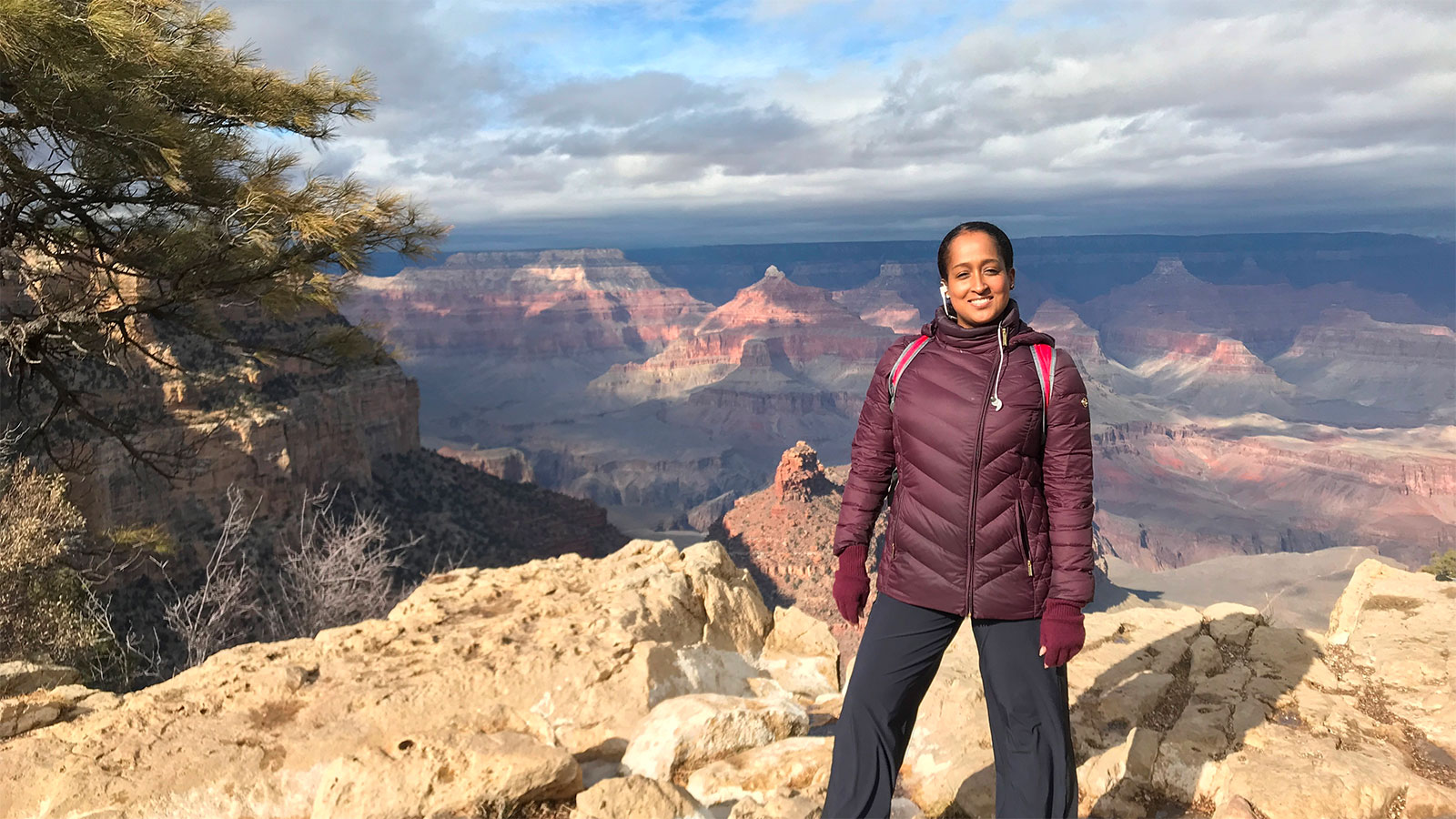 Photo of Alisa Gilmore at the south rim of the Grand Canyon. In 2016, Alisa hiked to the bottom of the canyon.