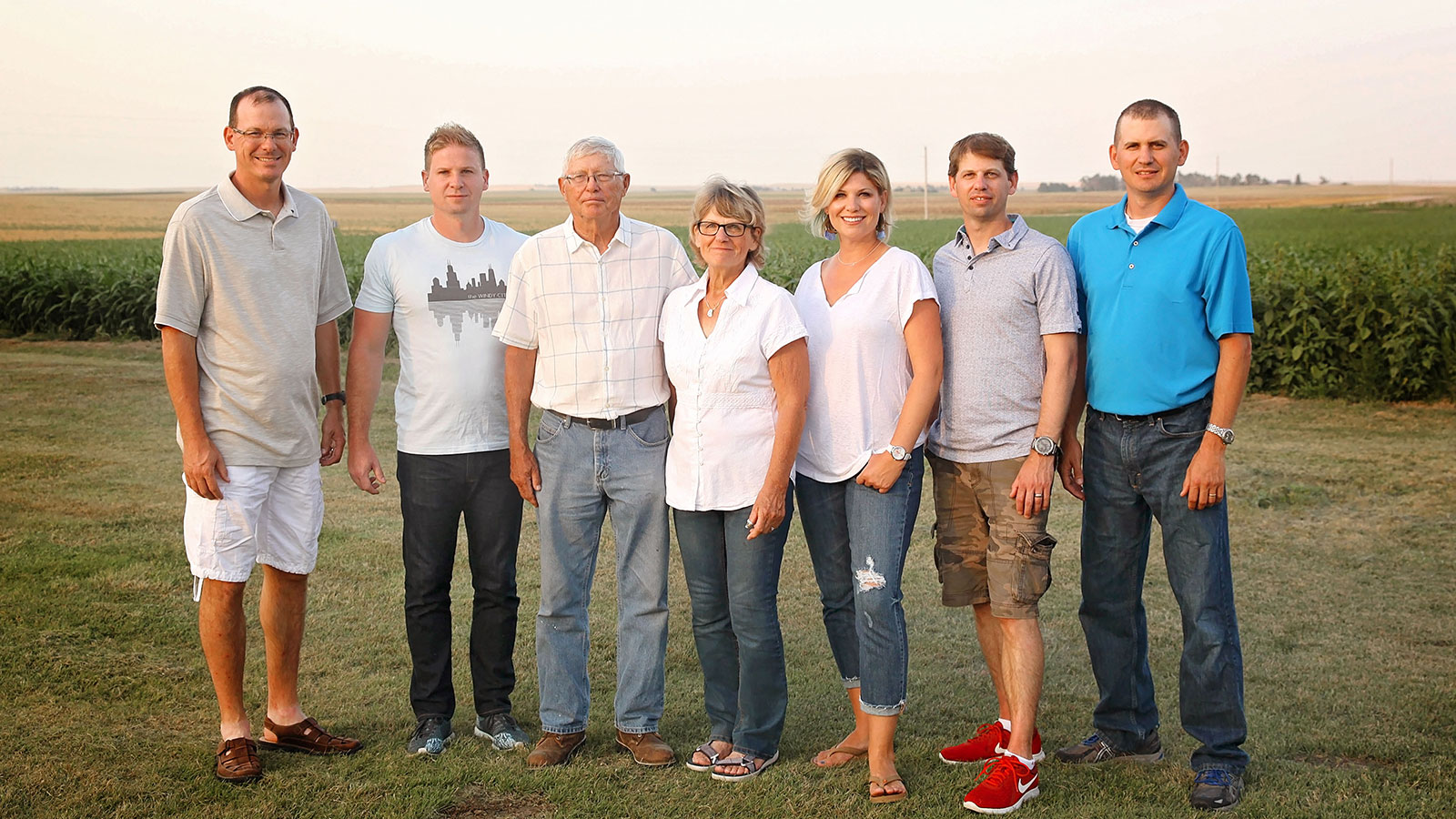 Paulsen Family posing for a photo in the country.