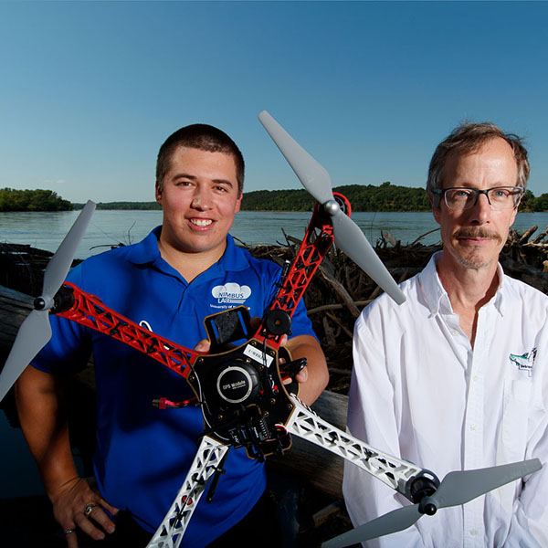 Daniel Rico (left), a master's student in computer science and engineering, and Craig Allen, research professor and director of the Nebraska Cooperative Fish and Wildlife Research Unit.