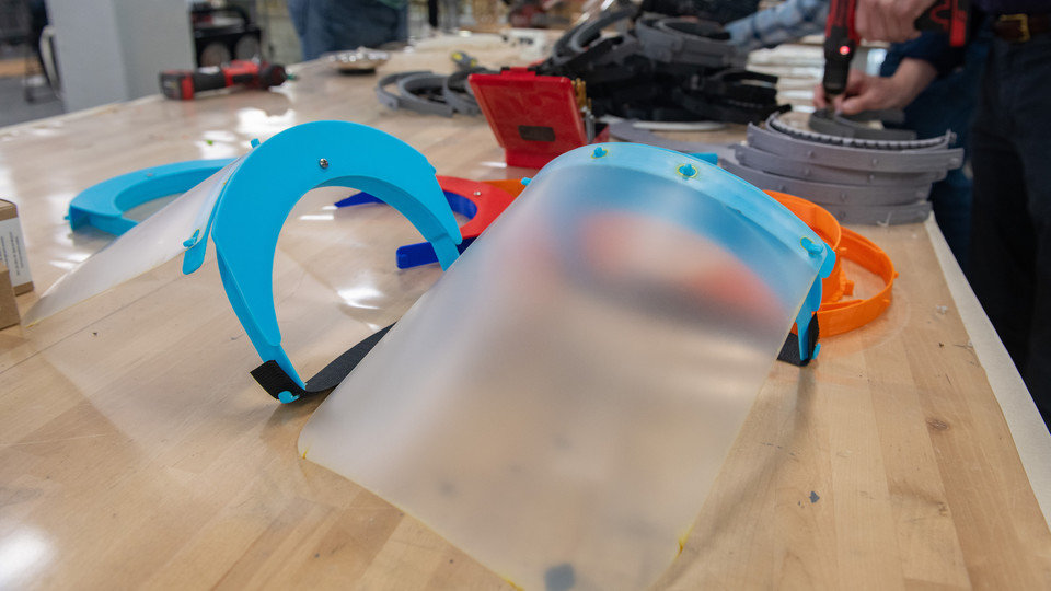 Face shields have been assembled from 3-D printed and laser-cut parts, and now, injection molding will be used to mass-produce parts for face shields. (University Communication)