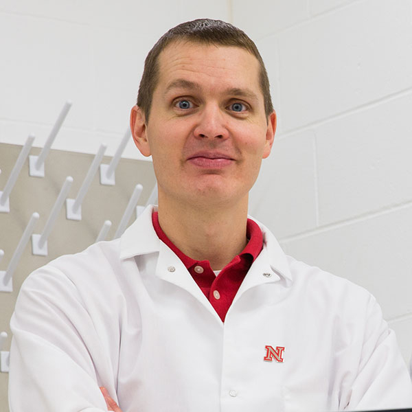 Dr. Benjamin Terry, assistant professor of mechanical and materials engineering, is designing and developing a new medical device that delivers oxygen microbubbles to patients whose lungs cannot function efficiently due to trauma. (Photo by Craig Chandler / University Communications)