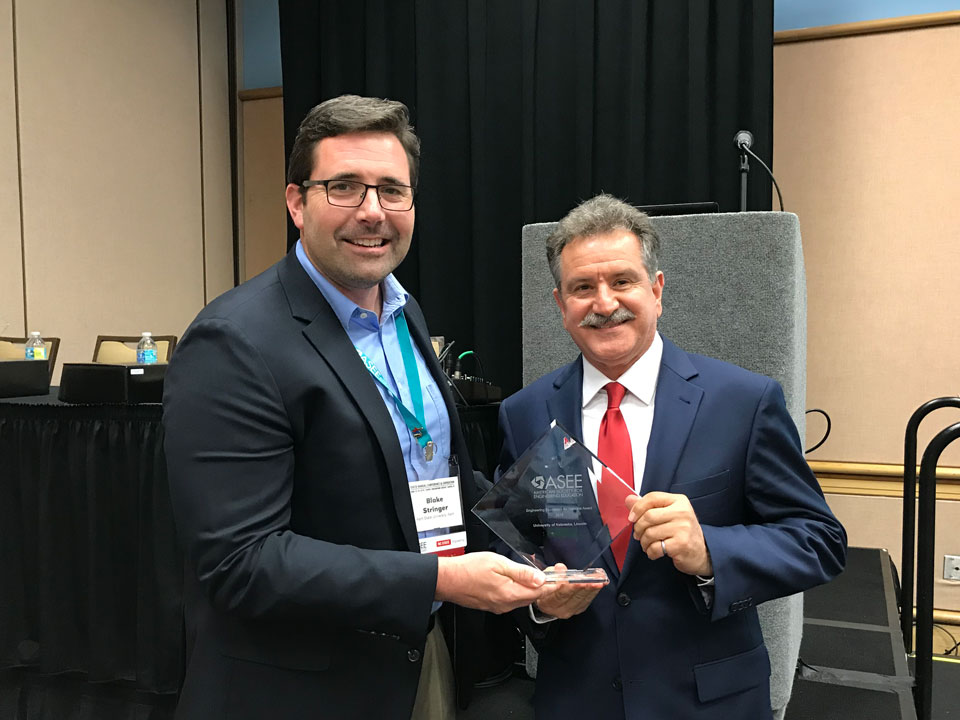 Dr. Sohrab Asgarpoor, associate dean for undergraduate programs, accepted the ASEE Excellence in Engineering for Veterans Award for the College of Engineering.