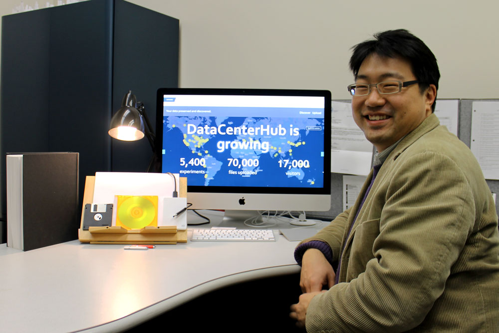 Dr. Chungwook Sim showing the front page of DataCenterHub, an online platform for sharing research data