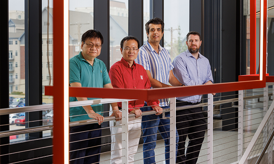 Nebraska Engineering researchers (from left) Yongfeng Lu, Bai Cui, Piyush Grover, and Keegan Moore are on teams that received three-year, $600,000 grants from the Defense Established Program to Stimulate Competitive Research (DEPSCoR). (Craig Chandler / University Communication and Marketing)