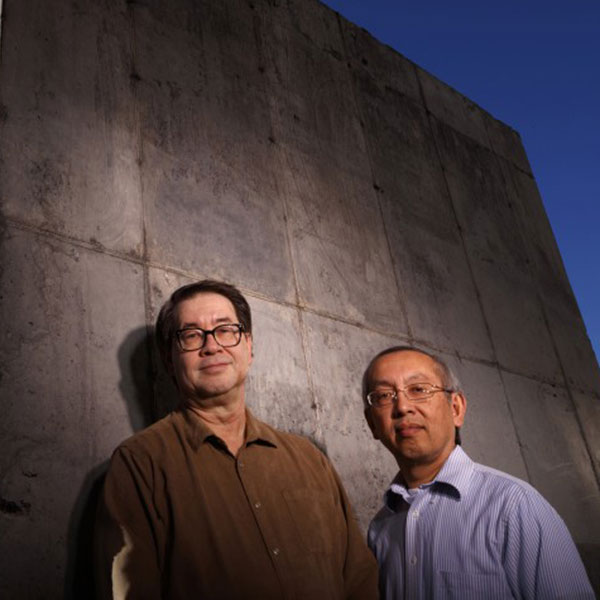 Nebraska engineers Christopher Tuan (left) and Lim Nguyen have developed a cost-effective concrete that shields against damaging electromagnetic energy.