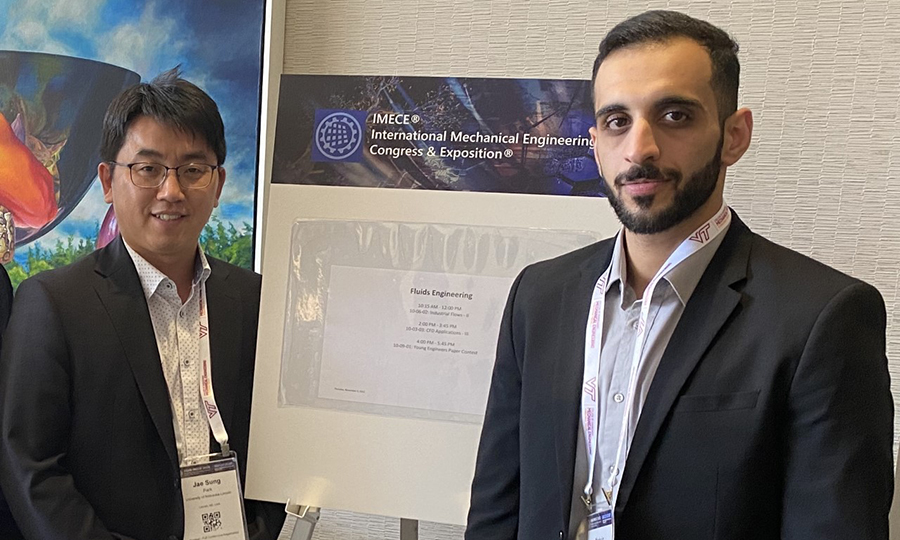 Mechanical engineering alum Mohsin Al Barwani (right) and Jae Sung Park, assistant professor of mechanical and materials engineering, receive the International Mechanical Engineering Congress & Exposition Young Engineers Paper Contest first-place certificate at the conference Oct. 30-Nov. 3, 2022, in Columbus, Ohio.