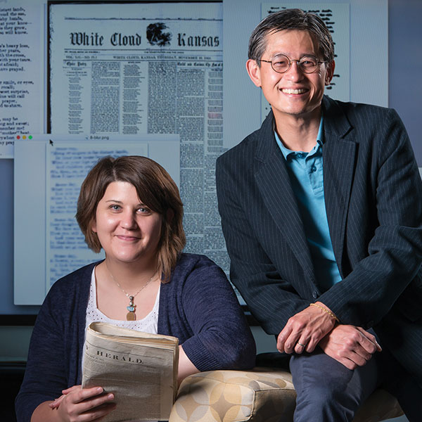 Elizabeth Lorang (left), associate professor in University Libraries and a fellow in the Center for Digital Research in the Humanities, joined with Leen-Kiat Soh, associate professor of computer science and engineering, to develop software to quickly scan and locate poetry among microfilmed newspapers.