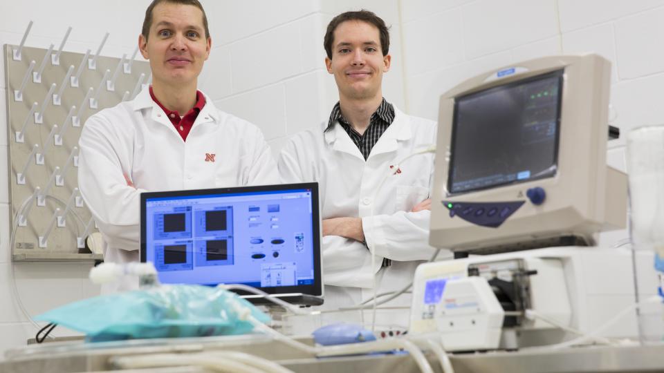 Ben Terry, Assistant Professor, Department of Mechanical and Materials Engineering, and graduate student Nathan Legband, in the small animal operating room. The Jan. 15 edition of the journal Biomaterials included work by Terry and Mark Borden of the University of Colorado, who collaborated to develop a new way for providing oxygen to people whose lungs cease to function.