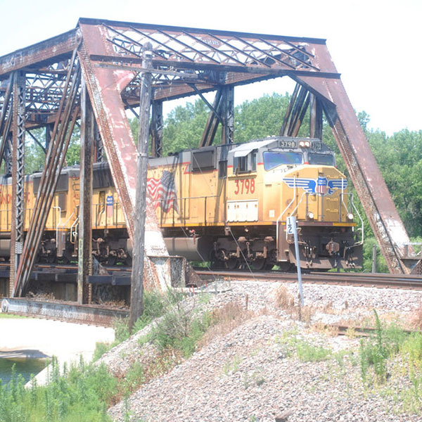 A Union Pacific Railroad train crosses the Loup River just west of Columbus. This bridge is part of a pilot project undertaken by Union Pacific and the Department of Civil Engineering at the University of Nebraska-Lincoln. (Photo by Columbus Telegram)