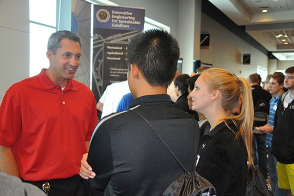 Students discussed career opportunities with professionals during the Company Expo at CenturyLink Center.
