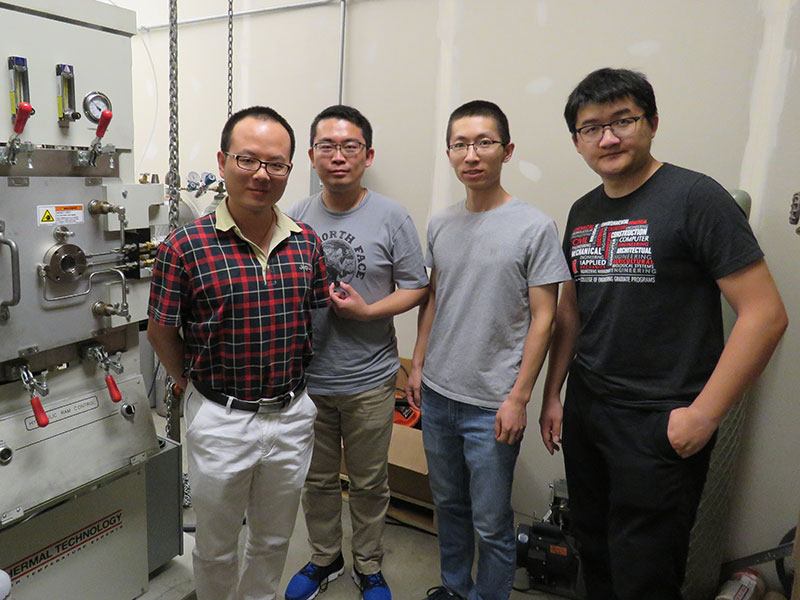 A team of Nebraska mechanical and materials engineers -- including (from left) assistant professor Bai Cui, Ph.D. students Fei Wang and Xiang Zhang and postdoctoral researcher Xueliang Yan -- is developing new materials to be used in the next generation of nuclear reactors.