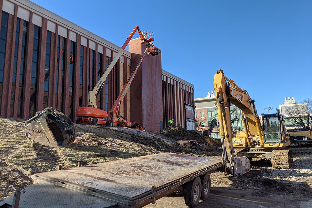 A robotic pneumatic jackhammer is used for demolition of a stairwell on the north side of Scott Engineering Center.