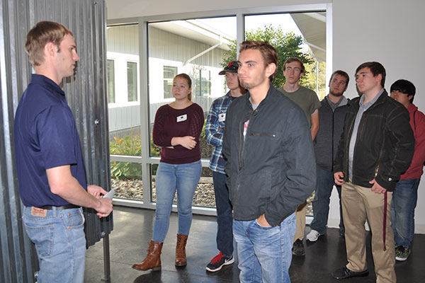 First-year UNL engineering students listen to engineer Jordan Hagemeyer during a tour of the Nucor Detailing Center in Norfolk on Oct. 9.