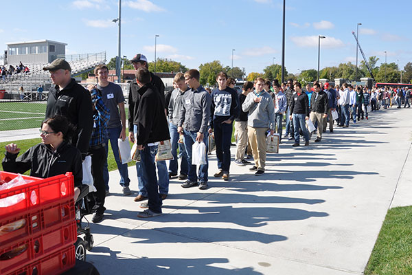 First-year UNL engineering students line up for lunch at Veterans Memorial Field during Norfolk Area Game Day on Oct. 9.