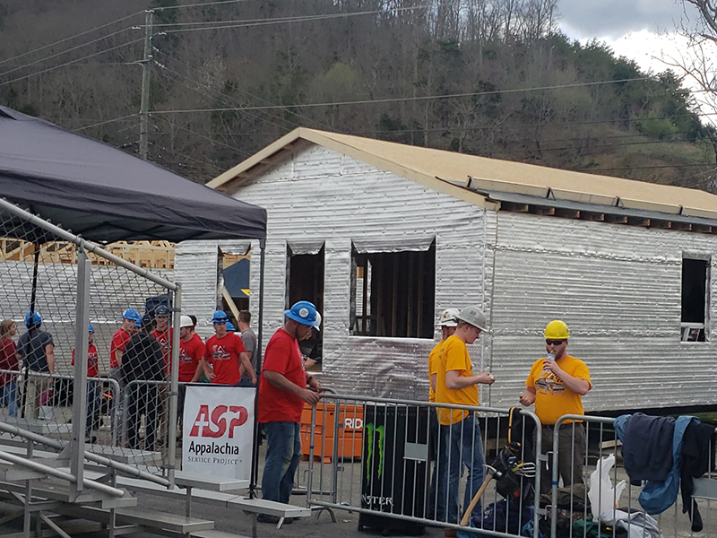 Nebraska construction management students work on one of the three houses they built as part of the Race to Build competition April 5-7 in Bristol, Tennessee.