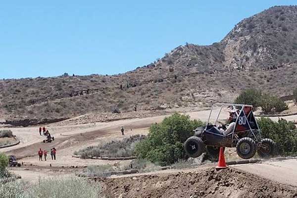 Driver Eric Rice takes the Husker Racing No. 80 car through the endurance course during the Baja SAE Collegiate Design Series event in Gorman, California.