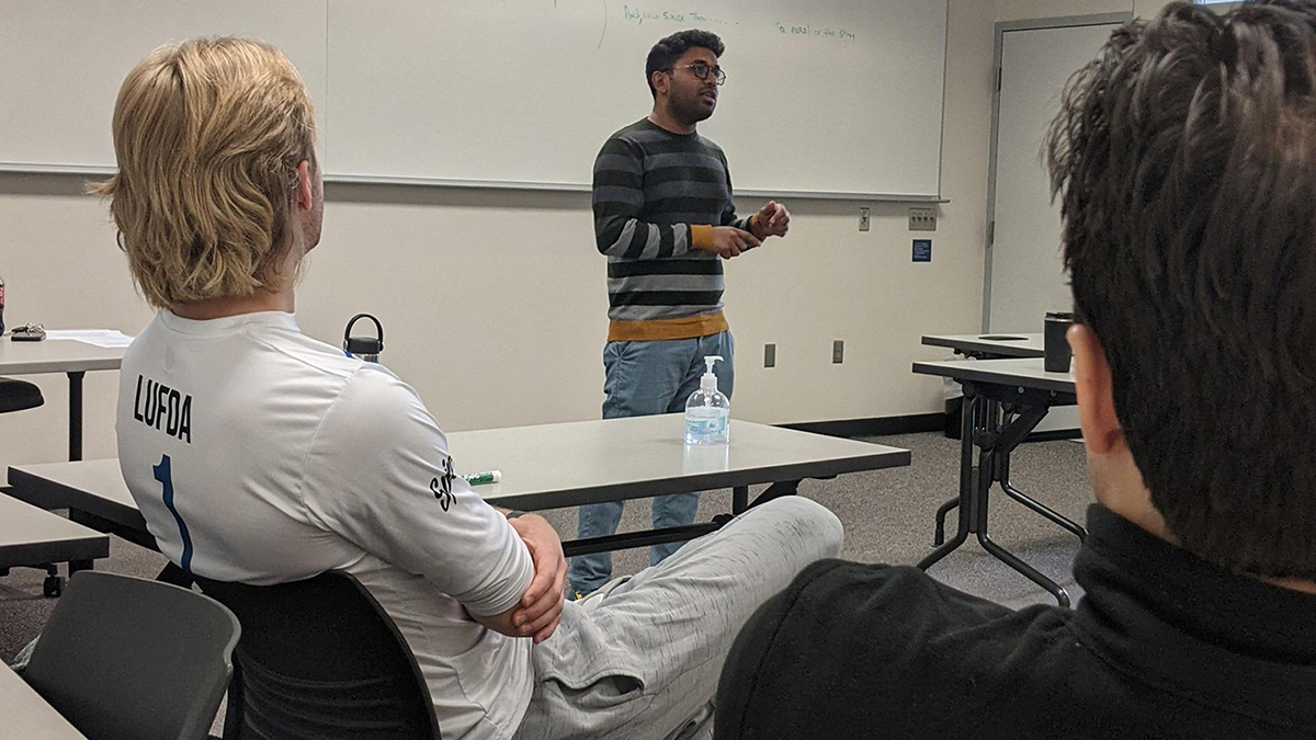 Sumitra Das, a master's student in construction engineering, gives a two-minute presentation on his research during the final day of class on Scott Campus.