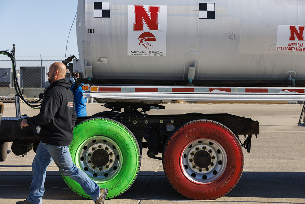 The front tires of the tanker are painted green and red to help researchers assess where and how the truck contacts the barrier being tested. (Craig Chandler / University Communication)