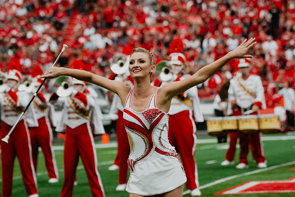 Kimberly Law, a freshman in chemical engineering from La Quinta, California, is one of two featured twirlers in the Cornhusker Marching Band. (Photo by Justin Mohling)