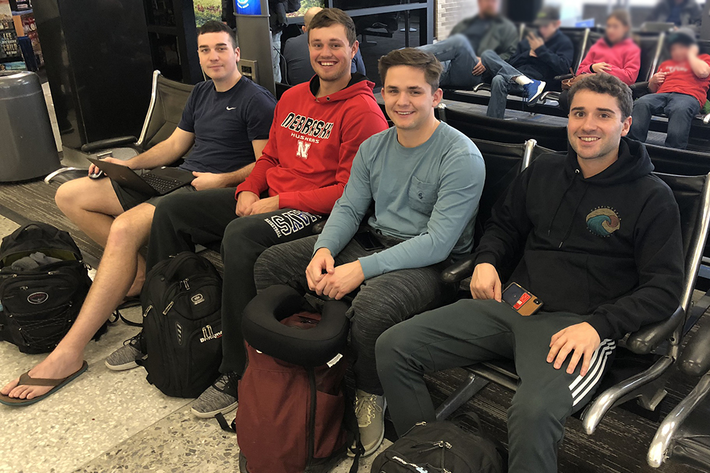 The Durham School construction student team of Zach Barnhill, Brad Hurtz, John Pupkes and Brady Standage waits to take off from the Lincoln Municipal Airport to begin their trip to Manchester, England.