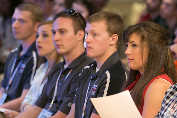 Members of the UNL MESC team - (from left) Peter Niechwiadowicz, Sarah Drummey, Adam Crnkovich, Tim Drake and Rose Gensichen - listen to a speaker March 22 during the MCAA conference in Orlando, Florida.