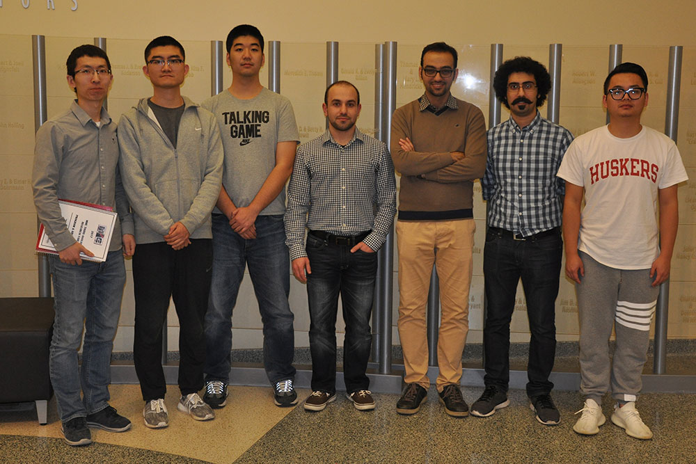 Among the graduate students honored in the poster competition were Dongyue Xie (far left, second place),  Fei Wang (third from left, third place) and Amir Monemian Esfahani (third from right, first place).