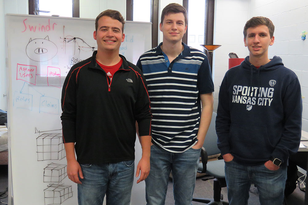 Team SWINDR - (from left) computer science major Keith Jett, computer engineering major Levi Hassel and computer science majors Alec Skinner and Justin Collier (not picutred) -- is working on an application that will allow farm workers to use 3-D camera technology to monitor the health of individual pigs in livestock pens.