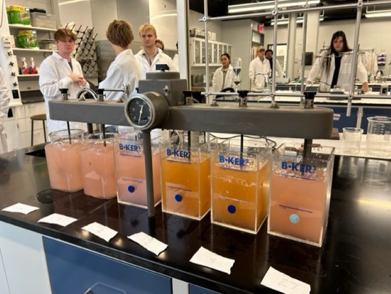 Students in lab near designed water filters