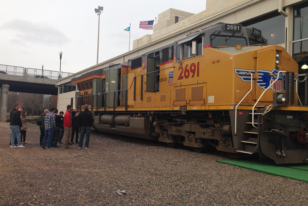 Nebraska Engineering students get a close-up look at a Union Pacific locomotive during a Tuesday (March 21) tour as part of the Complete Engineer Conference in Omaha.