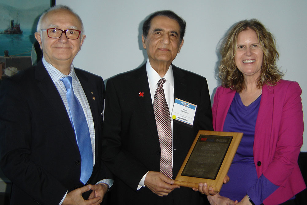Hamid Vakilzadian (center), professor of electrical and computer engineering, was presented with the George F. McClure Citation of Honor at the IEEE-USA Awards and Recognitions Ceremony on Feb. 3 in Burlingame, Calif.