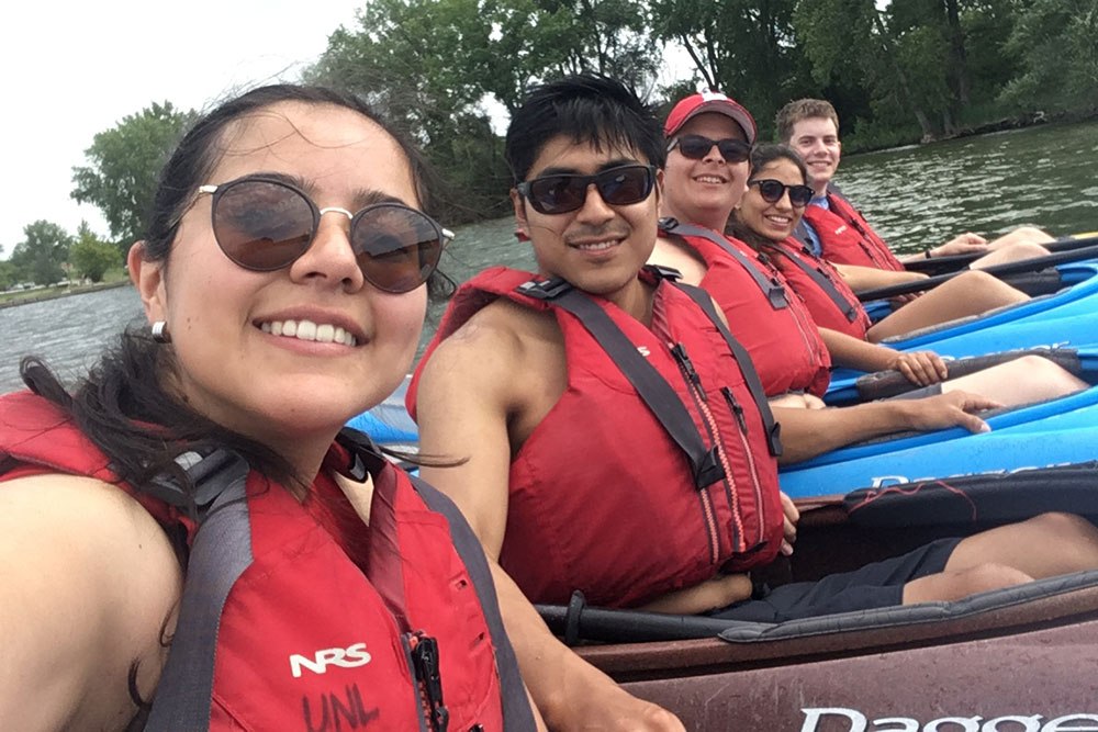 Yachay Tech students pause for a selfie during a kayaking adventure at a local lake.