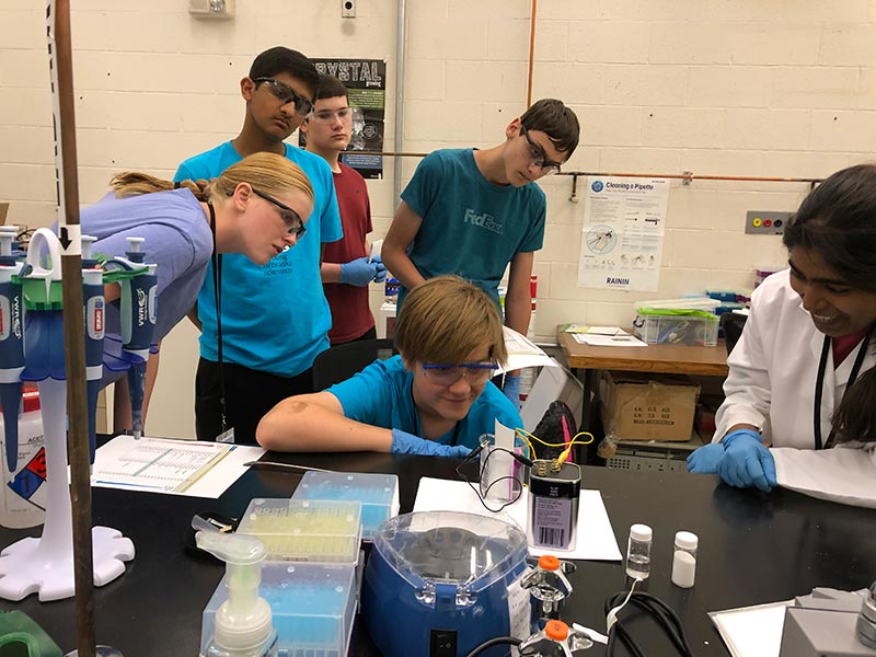 2019: Student doing an experiment at the Young Nebraska Scientists Camp.