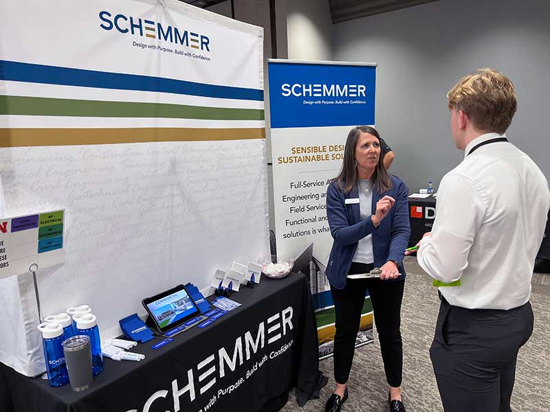 Lona Smart, talent acquisition and development strategist with Schemmer, visits with a student during the Durham School Career Fair on Tuesday, Oct. 4 in Omaha. 