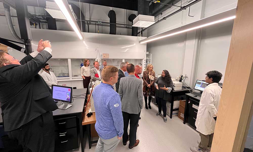 Shudipto Dishari (far right) provides information about the College’s Engineering Research Center to Chemical Engineering Advisory Board members during a tour on Oct. 26, 2023.