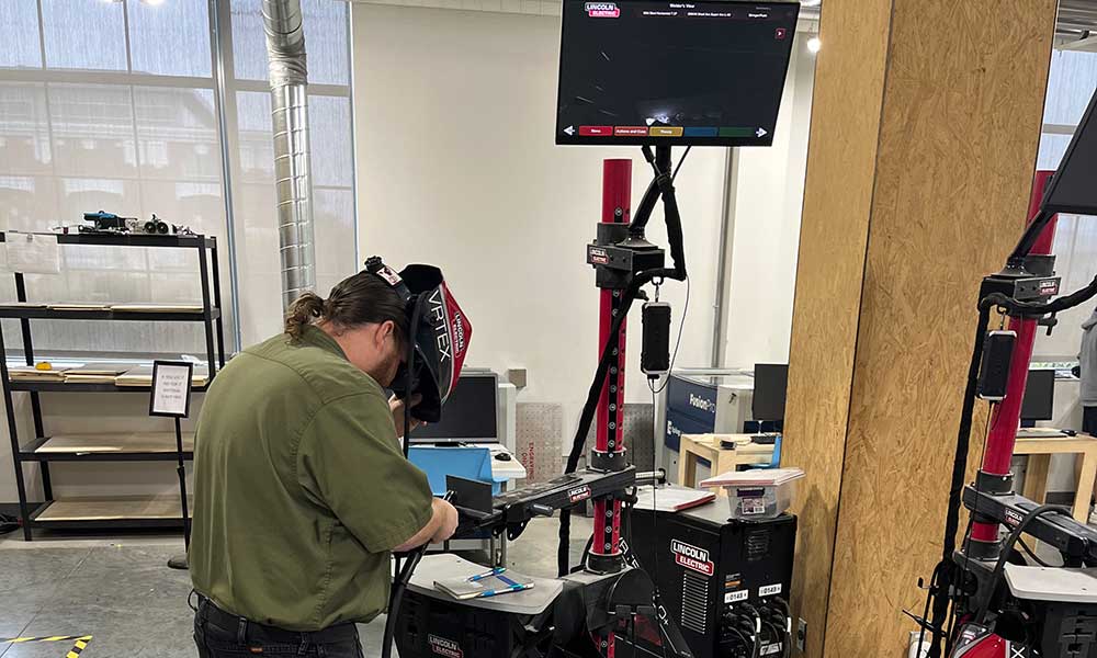 HRC Conference attendees were given tours of Innovation Campus, including a visit to the “virtual” Welding Booths inside Innovation Studio.