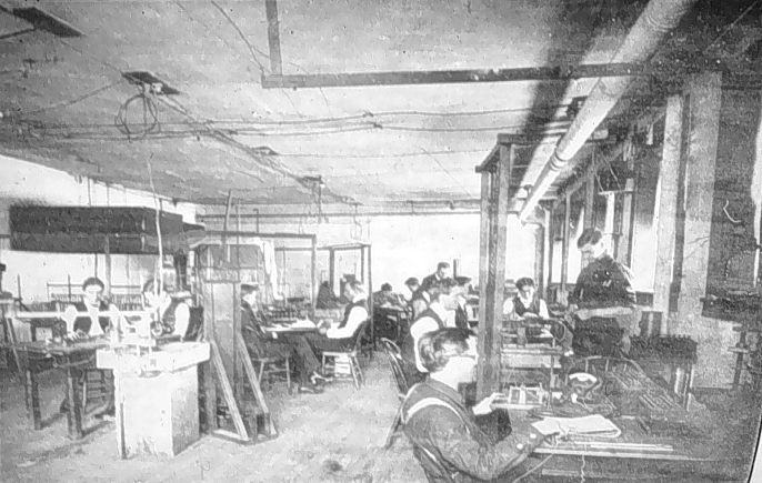 People working inside the early EE building