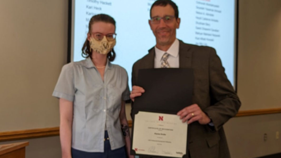 Alyssa with Dan Linzell receiving their certificate for the 2022 College of Engineering (COE) Professional Development Fellowship.