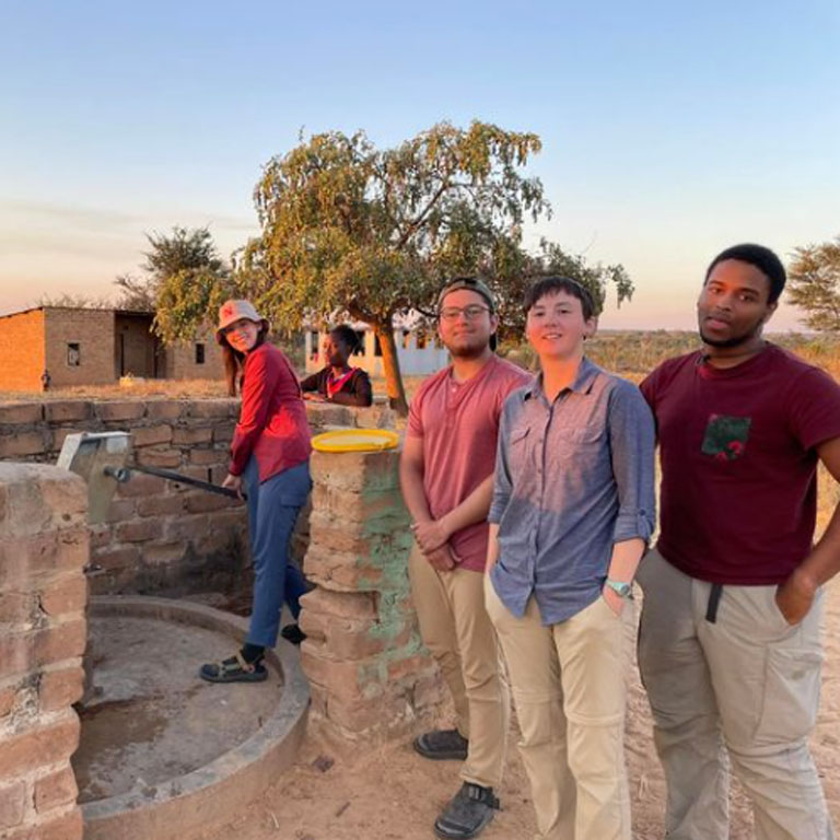 Engineers Without Borders students take a day off from their work in Zambia.
