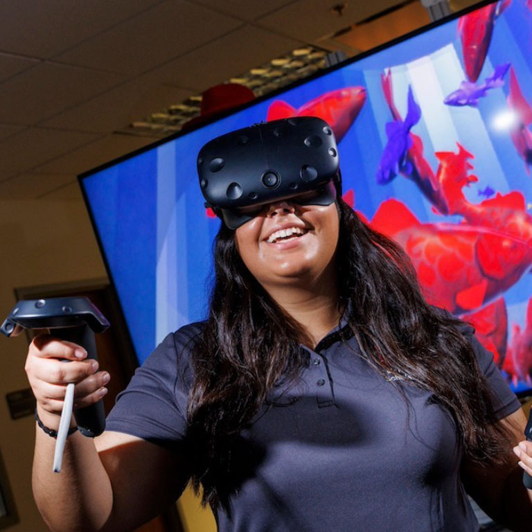 Young woman working with virtual reality.