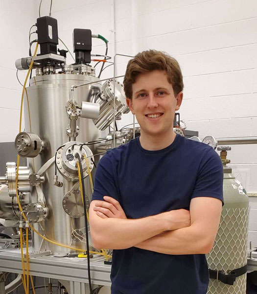 Matthew Hilfiker posing in a lab.
