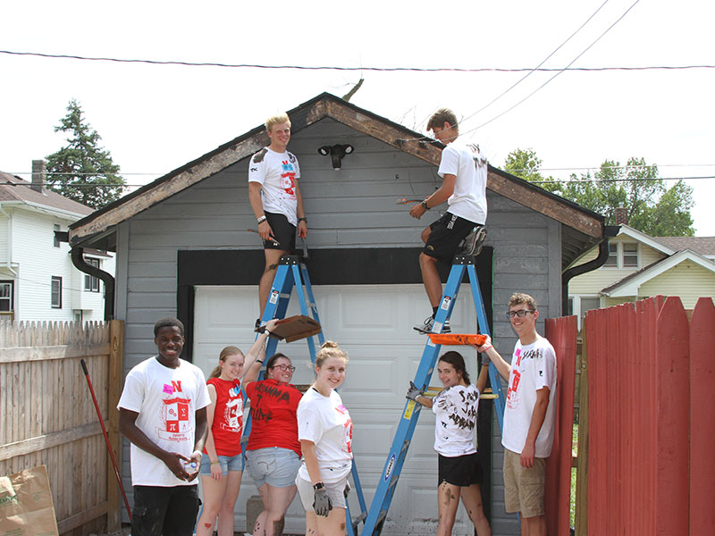 Students working on a Habitat for Humanity House