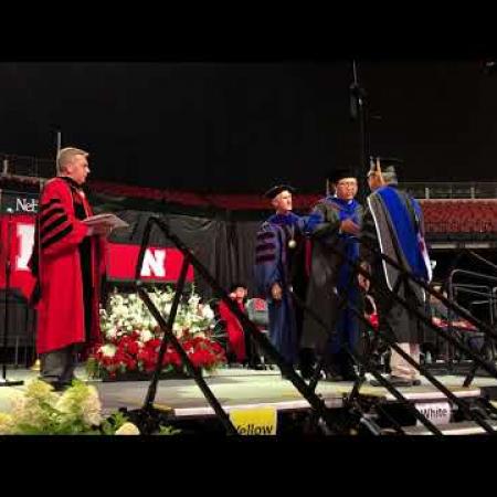 Video: Chenfei receives his diploma during the hooding ceremony