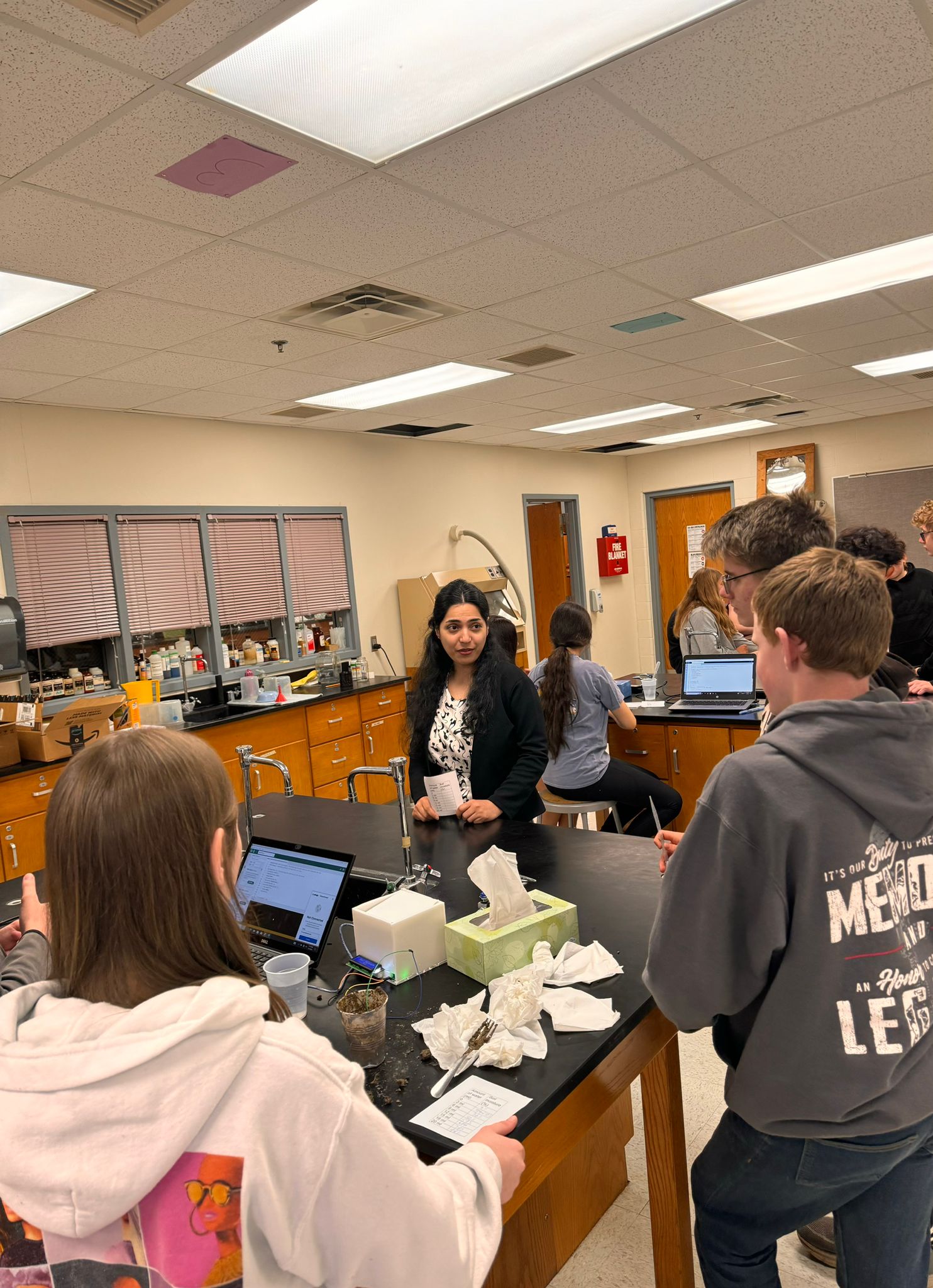 Graduate student Samereh Soleimani (shown in picture), is working on increasing the interest of high school students through a STEM outreach. They were tasked to work with an automated soil moisture sensor to determine the amount of moisture in the soil.