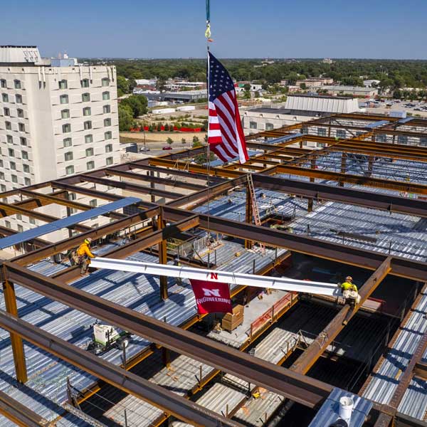 Photo taken from above by a drone of the final beam being put in place atop Kiewit Hall.