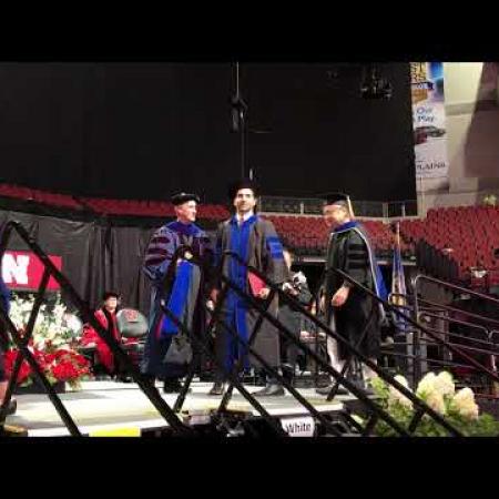 Video: Kamran receives his diploma during the hooding ceremony