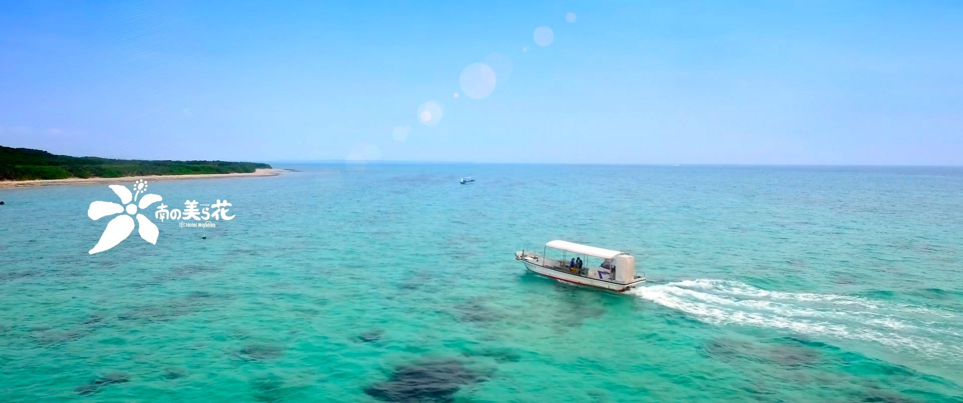 People on a boat in the ocean near Hotel Miyahira in Ishigaki, Okinawa, Japan