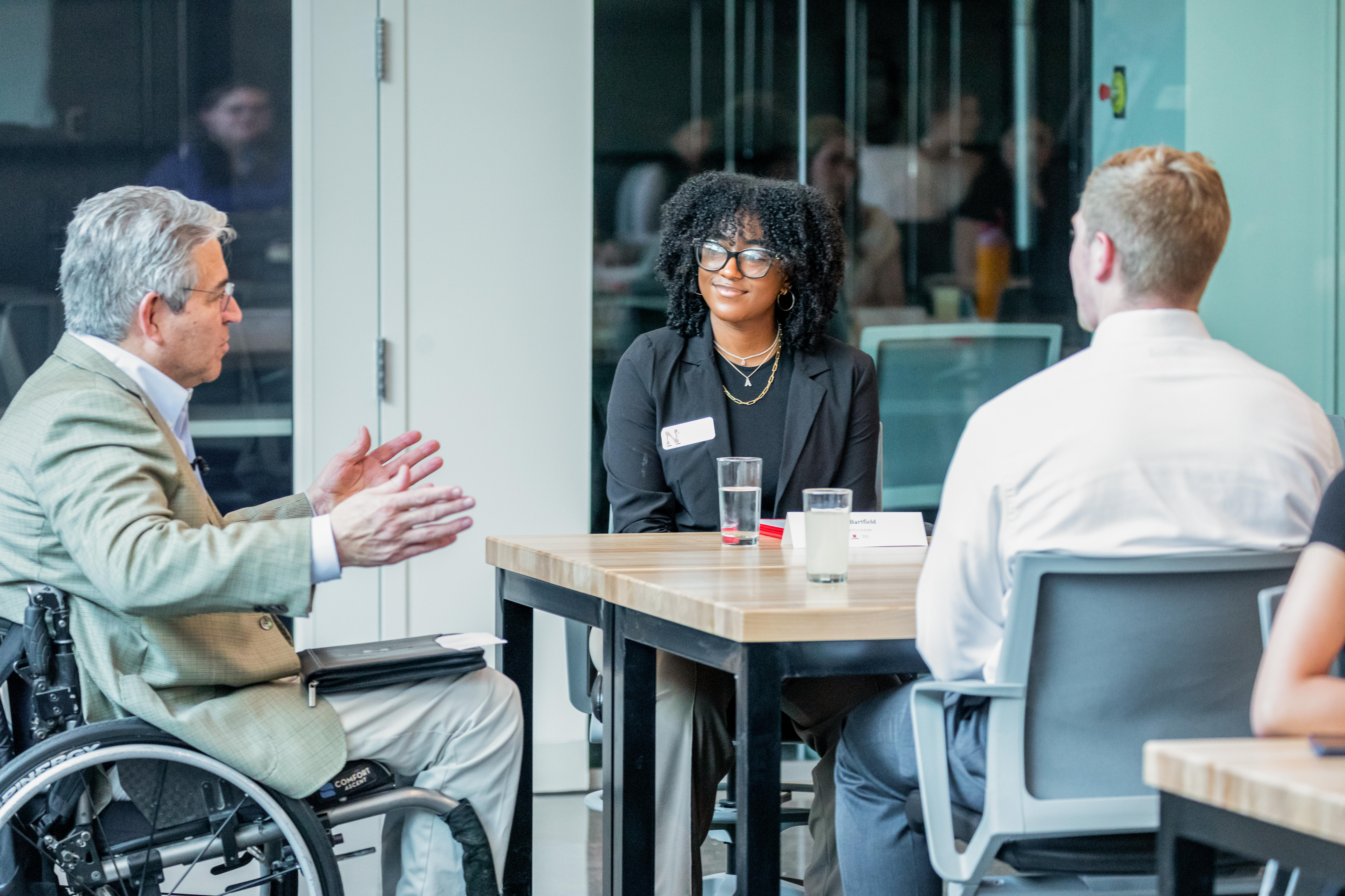 PKFEA students talking with the dean of the College of Engineering.
