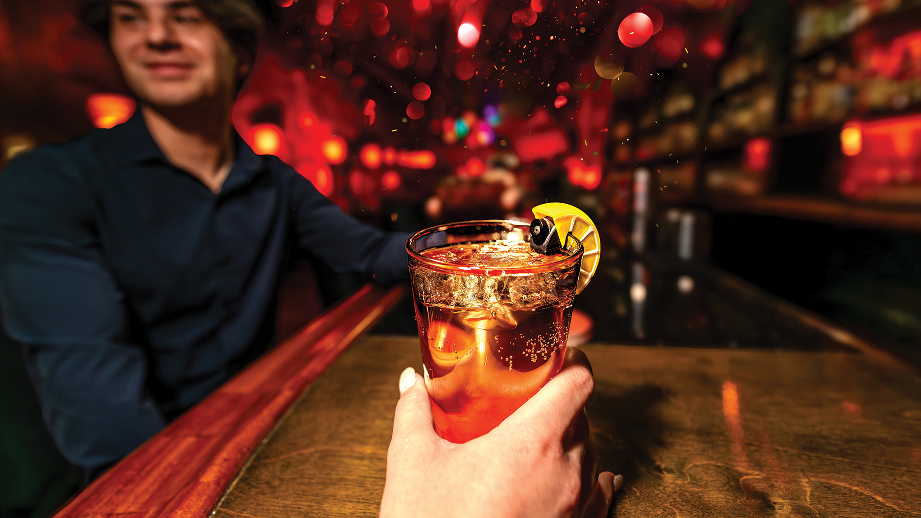 SipBuddy (with a faux-lemon covering) watching over a customer's drink.